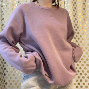 purple sweatshirt. never worn. very soft on the inside and keeps you warm